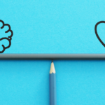 Pencils balancing a brain and a heart